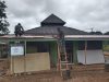 Semangat Tanpa Lelah, Anggota Satgas TMMD Ke-128 Kodim 0420/Sarko Perbaiki Atap Mushola Nurul Huda 