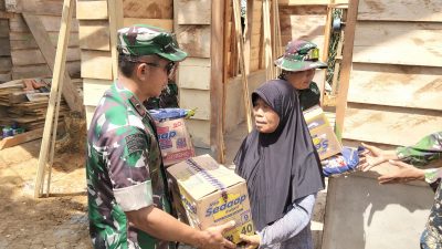 Danrem 042/Gapu Bagikan Sembako kepada Warga Penerima RLH di Desa Seko Besar
