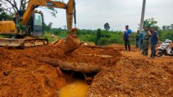 Satgas TMMD ke 128 Kodim 0420/Sarko Ratakan Jalan Menuju Desa Seko Besar